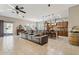 Open floor plan with kitchen island and living area at 10062 W Redbird Rd, Peoria, AZ 85383