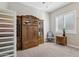 Spacious office with wood cabinetry and comfortable seating at 10062 W Redbird Rd, Peoria, AZ 85383