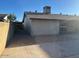 Backyard with patio and access gate at 10138 W Highland Ave, Phoenix, AZ 85037