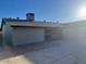 Backyard with patio and access gate at 10138 W Highland Ave, Phoenix, AZ 85037