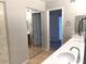 Double vanity bathroom with a mirrored closet at 10138 W Highland Ave, Phoenix, AZ 85037
