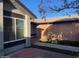 Side yard with walkway leading to the back of the home at 10138 W Highland Ave, Phoenix, AZ 85037