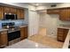 Kitchen with stainless steel appliances and wood cabinets at 10138 W Highland Ave, Phoenix, AZ 85037