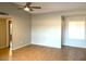 Spacious living room with neutral walls and tile floors at 10138 W Highland Ave, Phoenix, AZ 85037