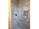 Shower with marble tile and modern fixtures at 10138 W Highland Ave, Phoenix, AZ 85037