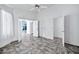 Bright bedroom with tile floors and access to other rooms at 10634 W Mohawk Ln, Peoria, AZ 85382