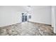 Bedroom with tile flooring and sliding glass door to backyard at 10634 W Mohawk Ln, Peoria, AZ 85382