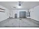 Garage interior with storage cabinets and shelving at 10634 W Mohawk Ln, Peoria, AZ 85382