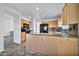 Eat-in kitchen with an island and plenty of counter space at 10634 W Mohawk Ln, Peoria, AZ 85382