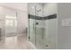 Modern bathroom with glass shower and stylish tile at 11667 W Marguerite Ave, Avondale, AZ 85323