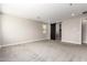 Spacious bedroom with barn door and en-suite bathroom at 11667 W Marguerite Ave, Avondale, AZ 85323