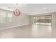 Bright dining room with sliding glass doors to backyard at 11667 W Marguerite Ave, Avondale, AZ 85323