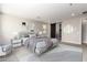 Spacious main bedroom with a neutral color scheme and an en-suite bathroom at 11667 W Marguerite Ave, Avondale, AZ 85323