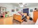 Simple bedroom with a wooden bed frame and dresser at 120 N Val Vista Dr # 186, Mesa, AZ 85213