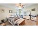 Cozy bedroom with a queen-size bed and dresser at 120 N Val Vista Dr # 186, Mesa, AZ 85213