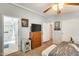 Relaxing bedroom with a full-size bed, dresser and ensuite bathroom access at 120 N Val Vista Dr # 186, Mesa, AZ 85213