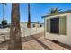 Exterior view of the property with shed and fence at 120 N Val Vista Dr # 186, Mesa, AZ 85213