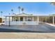 Inviting manufactured home with covered carport and landscaped yard at 120 N Val Vista Dr # 186, Mesa, AZ 85213