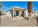 Exterior view of the property showing carport and landscaping at 120 N Val Vista Dr # 186, Mesa, AZ 85213