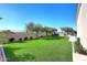 Expansive grassy backyard with a fence at 12079 E Cortez Dr, Scottsdale, AZ 85259