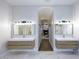 Spa-like bathroom with double vanity, large mirrors and separate shower at 12079 E Cortez Dr, Scottsdale, AZ 85259