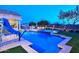 Inviting pool with a slide and basketball hoop at 12079 E Cortez Dr, Scottsdale, AZ 85259