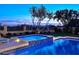 Luxury pool and spa with mountain views at sunset at 12079 E Cortez Dr, Scottsdale, AZ 85259