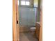 Clean bathroom with a tub, shower, and toilet at 12979 W Roy Rogers Rd, Peoria, AZ 85383