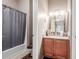 Clean bathroom with a shower/tub combo and granite vanity at 1331 W Baseline Rd # 251, Mesa, AZ 85202