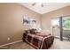 Bedroom with sliding door access to balcony at 1331 W Baseline Rd # 251, Mesa, AZ 85202