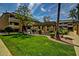 Landscaped courtyard with pergola and walkways at 1331 W Baseline Rd # 251, Mesa, AZ 85202
