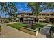 Community courtyard with seating and building view at 1331 W Baseline Rd # 251, Mesa, AZ 85202