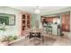 Bright dining area with a round table and four chairs, ideal for everyday meals at 1331 W Baseline Rd # 251, Mesa, AZ 85202