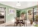Bright dining area with patio access and built in cabinetry at 1331 W Baseline Rd # 251, Mesa, AZ 85202