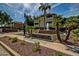 Building exterior with landscaping and fountain at 1331 W Baseline Rd # 251, Mesa, AZ 85202