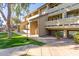 Apartment building exterior showcasing landscaping and walkway at 1331 W Baseline Rd # 251, Mesa, AZ 85202