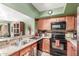 Well-equipped kitchen featuring granite countertops and ample cabinetry at 1331 W Baseline Rd # 251, Mesa, AZ 85202