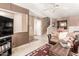 Spacious living room with a view into hallway and stairs at 1331 W Baseline Rd # 251, Mesa, AZ 85202