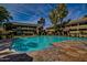Inviting community pool with stone deck at 1331 W Baseline Rd # 251, Mesa, AZ 85202