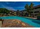 Resort-style pool with flagstone deck and comfortable lounge chairs at 1331 W Baseline Rd # 251, Mesa, AZ 85202