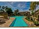 Community pool with surrounding patio at 1331 W Baseline Rd # 251, Mesa, AZ 85202