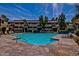 Sparkling community pool with stone deck and ample lounge chairs at 1331 W Baseline Rd # 251, Mesa, AZ 85202