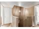 Upstairs hallway with light fixture and access to bedrooms at 1331 W Baseline Rd # 251, Mesa, AZ 85202