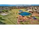 Community park with lake, walking paths, dog park, and playground at 1458 S Kadota Dr, Gilbert, AZ 85296