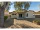 Large backyard with gravel and covered patio at 15144 W Washington St, Goodyear, AZ 85338