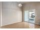 Bright dining area with tile flooring and access to the patio at 15144 W Washington St, Goodyear, AZ 85338