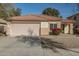 Single-story home with attached garage and landscaping at 15144 W Washington St, Goodyear, AZ 85338