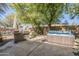 Outdoor kitchen, hot tub, and patio area at 16364 W Roosevelt St, Goodyear, AZ 85338