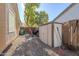 Backyard with storage shed and gravel at 16364 W Roosevelt St, Goodyear, AZ 85338