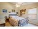 Bedroom with ceiling fan and decorative bedding at 16364 W Roosevelt St, Goodyear, AZ 85338
